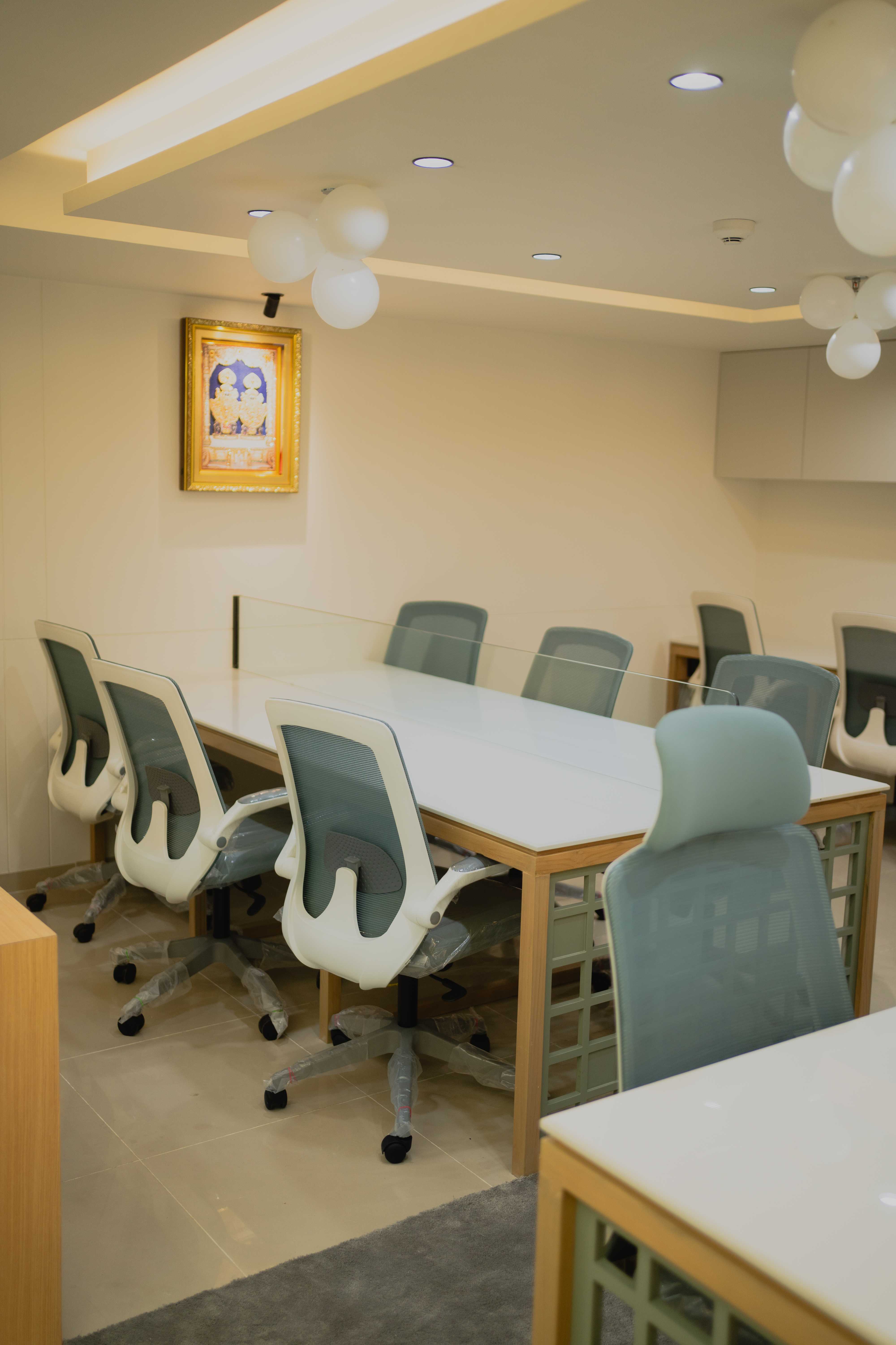 Modern workspace at Pujara & Co office with ergonomic seating